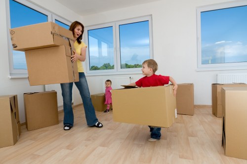 Packing team preparing fragile belongings for a move in Penge