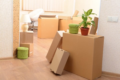 Person handling stored items carefully in a storage environment